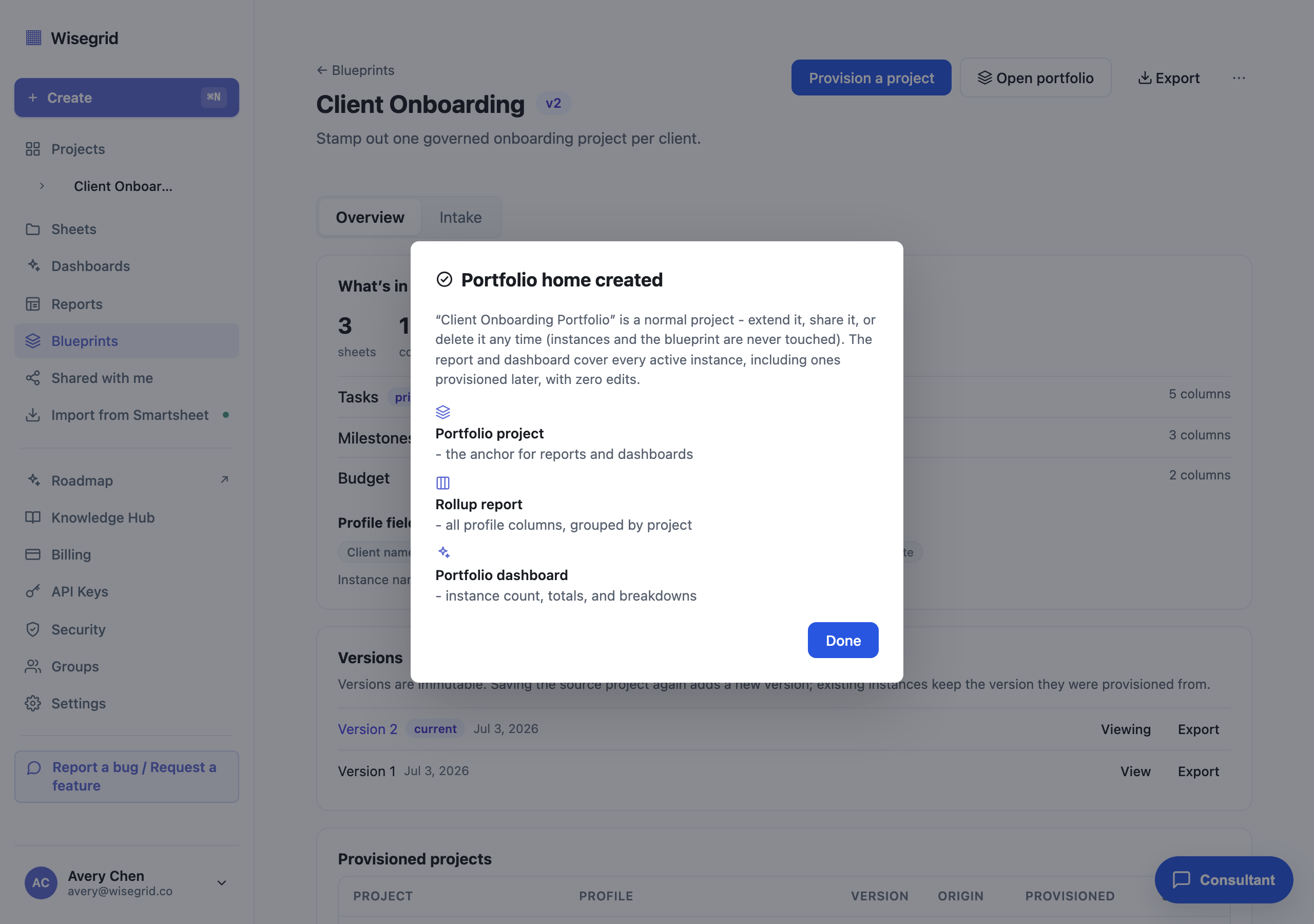 The portfolio created dialog linking the new portfolio project, the rollup report grouped by project, and the portfolio dashboard.